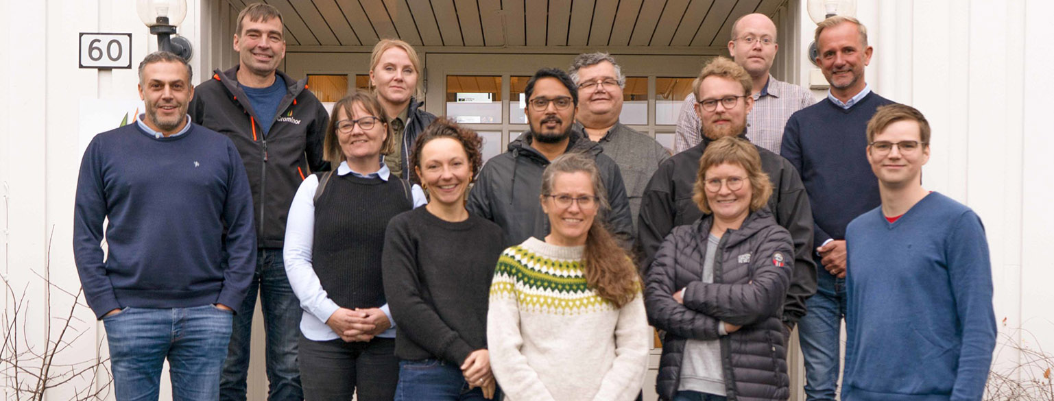 A group of people standing outside 