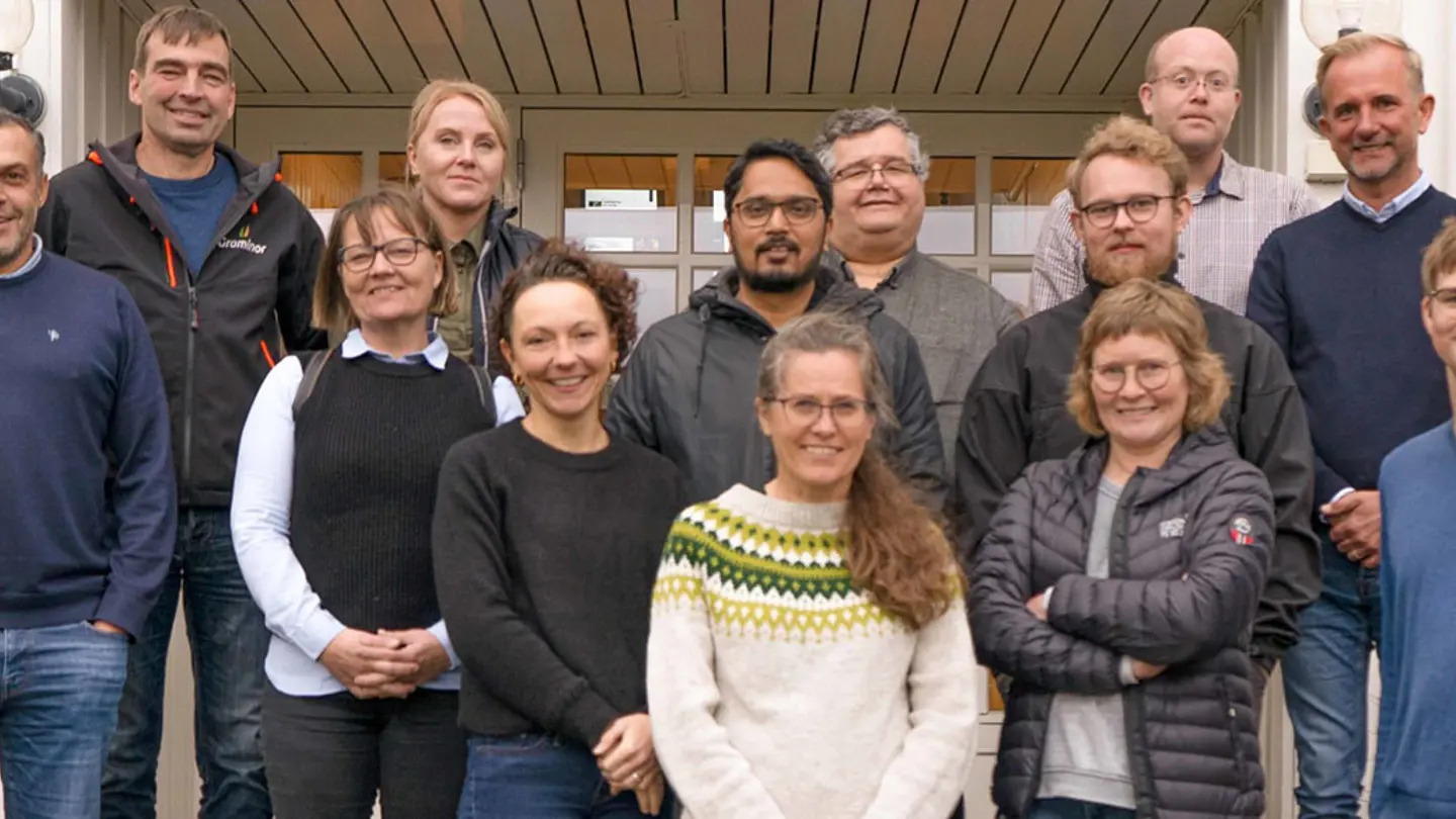 A group of people standing outside