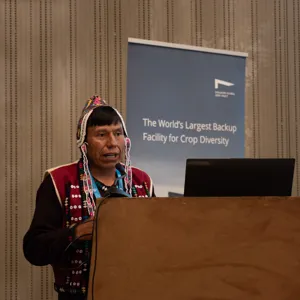 Man speaking at a podium.