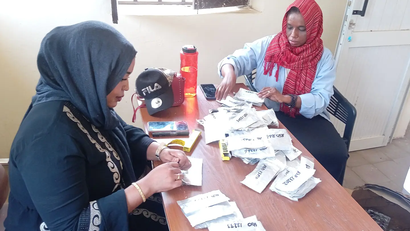 Women holding small bags