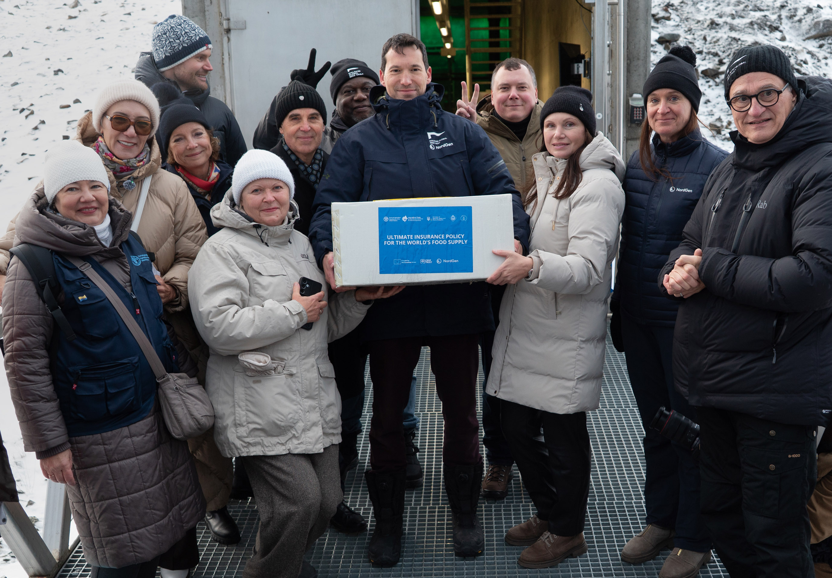 Group of people with boxes. 